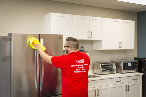 janitor cleaning a kitchen