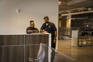 Two security guards on shift protecting a corporate office