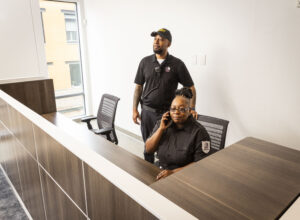 2 Security Guards on duty at front desk