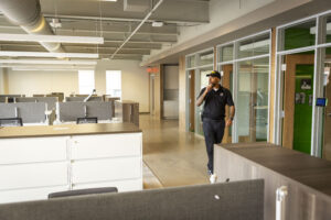On-site security guard making rounds around office after business hours