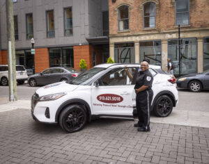 security guard with patrol car