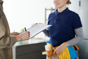 Subcontracted cleaning service agreement being signed