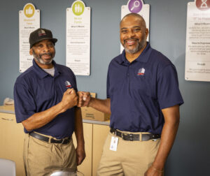 Outsourced Commercial Cleaners fist bump