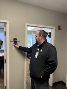 security data being captured by security guard scanning checkpoint